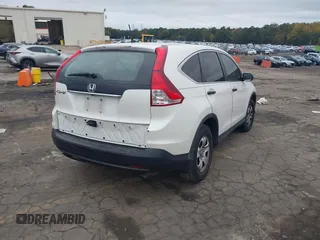 2014 Honda CR-V LX with VIN 5J6RM3H39EL015673, listed as a IAAI auction lot 40808262 with 156,729 mi miles. Bid and sale history available at carsss.com. Image 4.
