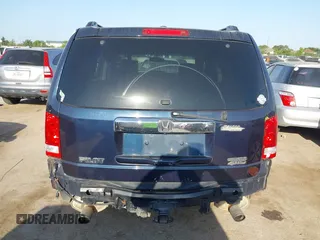 2011 Honda Pilot Touring with VIN 5FNYF4H92BB090056, listed as a IAAI auction lot 42010682 with 201,640 mi miles. Bid and sale history available at carsss.com. Image 16.