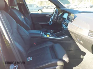 2023 BMW X5 xDrive40i with VIN 5UXCR6C01P9P96005, listed as a IAAI auction lot 41415624 with 15,879 mi miles and . Bid and sale history available at DreamBid. Image 5.