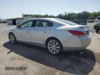 2012 Buick LaCrosse Touring with VIN 1G4GJ5E39CF250328, listed as a Copart auction lot 56873415 with 118,664 mi miles and Salvage title. Bid and sale history available at DreamBid. Image 2.