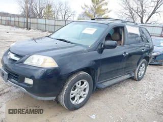 2005 Acura MDX Touring with VIN 2HNYD18945H514351, listed as a IAAI auction lot 41688097 with 323,000 mi miles. Bid and sale history available at carsss.com. Image 2.