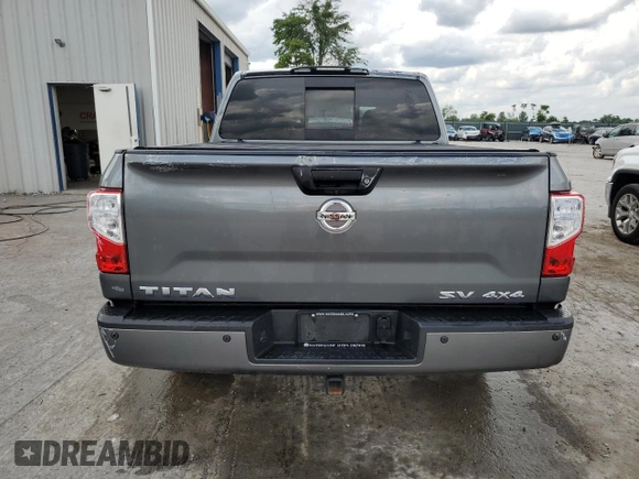 2017 Nissan Titan SV z VIN 1N6AA1E53HN539039, wystawiony jako Copart lot #58236775 z przebiegiem 67 033 mil mil oraz Szkoda całkowita • Salvage title. Historia ofert i sprzedaży dostępna na DreamBid. Obrazek 6.