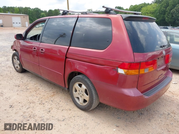 2002 Honda Odyssey EX with VIN 5FNRL18612B028570, listed as a IAAI auction lot 42491201 with 203,401 mi miles and . Bid and sale history available at DreamBid. Image 3.