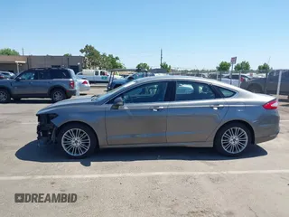 2014 Ford Fusion SE Hybrid with VIN 3FA6P0LU5ER393530, listed as a IAAI auction lot 42478440 with 93,728 mi miles and . Bid and sale history available at DreamBid. Image 15.