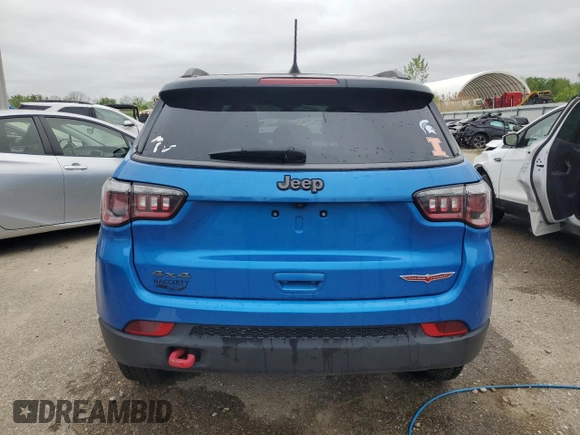 2018 Jeep Compass Trailhawk with VIN 3C4NJDDBXJT139496, listed as a Copart auction lot 57068265 with 105,809 mi miles and Salvage title. Bid and sale history available at DreamBid. Image 6.