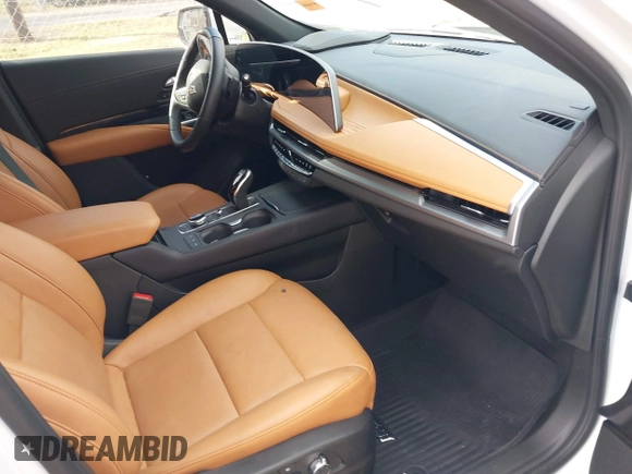 2024 Cadillac XT4 FWD Sport with VIN 1GYFZER48RF180481, listed as a IAAI auction lot 41093587 with 3,982 mi miles and . Bid and sale history available at DreamBid. Image 5.
