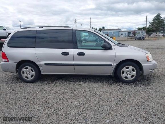 2004 Ford Freestar Wagon SE with VIN 2FMZA51664BA73569, listed as a IAAI auction lot 39712844 with 182,013 mi miles. Bid and sale history available at carsss.com. Image 13.