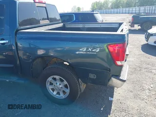 2004 Nissan Titan LE with VIN 1N6AA07B74N547779, listed as a IAAI auction lot 41977881 with 157,348 mi miles and . Bid and sale history available at carsss.com. Image 13.