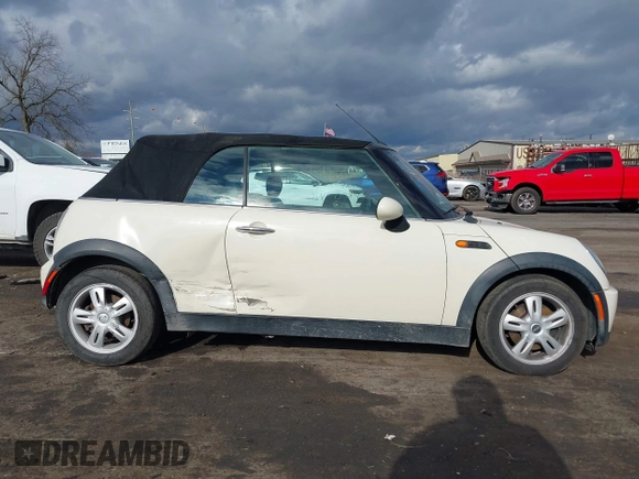 2006 MINI Convertible with VIN WMWRF33566TF65410, listed as a IAAI auction lot 40813052 with 131,109 mi miles and . Bid and sale history available at DreamBid. Image 13.