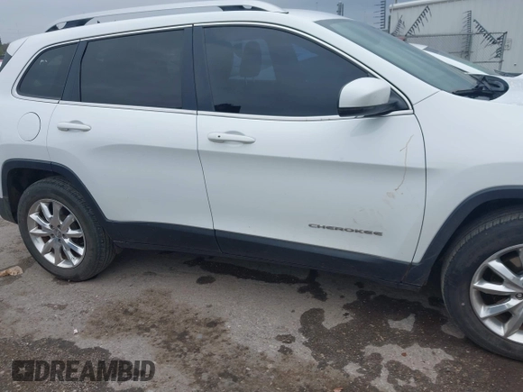 2016 Jeep Cherokee Limited z VIN 1C4PJMDS6GW182082, wystawiony jako IAAI lot #41943408 z przebiegiem 141 796 mil mil oraz . Historia ofert i sprzedaży dostępna na DreamBid. Obrazek 14.