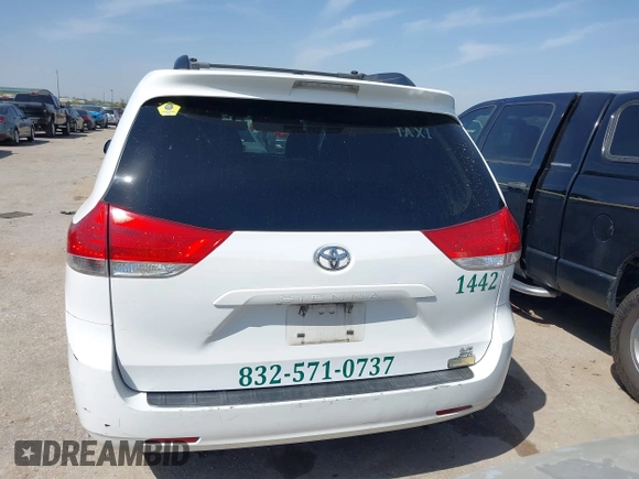 2014 Toyota Sienna LE with VIN 5TDJK3DC5ES081232, listed as a IAAI auction lot 41789629 with 397,033 mi miles and . Bid and sale history available at DreamBid. Image 16.