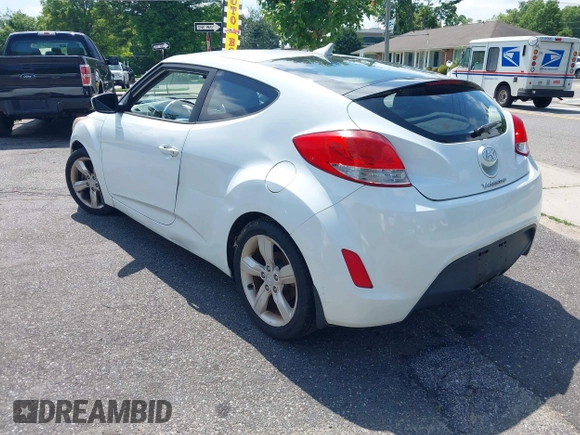 2013 Hyundai Veloster RE:MIX with VIN KMHTC6AD4DU173426, listed as a IAAI auction lot 42551270 with 91,560 mi miles and . Bid and sale history available at DreamBid. Image 3.