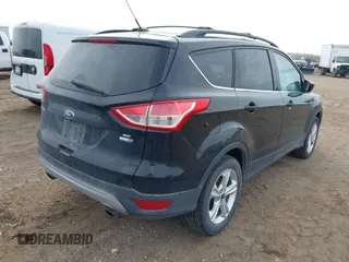 2016 Ford Escape SE with VIN 1FMCU9G98GUA63081, listed as a IAAI auction lot 42101978 with 199,468 mi miles and . Bid and sale history available at DreamBid. Image 4.