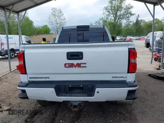 2016 GMC Sierra 2500HD Denali with VIN 1GT12UE86GF267431, listed as a IAAI auction lot 42091770 with 128,525 mi miles and . Bid and sale history available at DreamBid. Image 17.