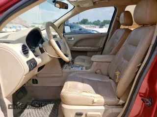 2005 Ford Freestyle SE with VIN 1FMZK01105GA54885, listed as a Copart auction lot 58414145 with 306,275 mi miles and Salvage title. Bid and sale history available at DreamBid. Image 7.