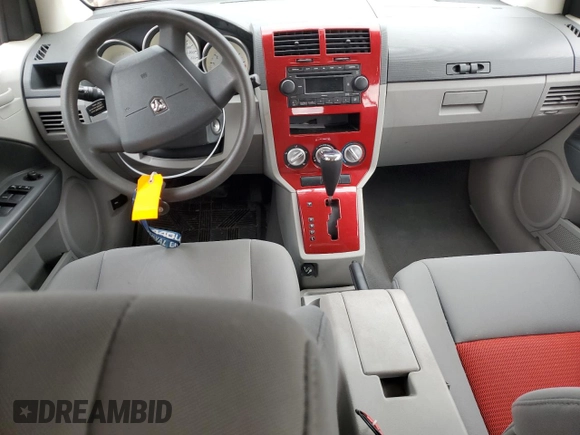 2007 Dodge Caliber SXT z VIN 1B3HB48B07D580803, wystawiony jako Copart lot #76931074 z przebiegiem 146 833 mil mil oraz Szkoda całkowita • Salvage title. Historia ofert i sprzedaży dostępna na DreamBid. Obrazek 8.