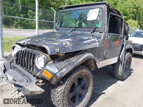 2003 Jeep Wrangler Sport z VIN 1J4FA49S53P317779, wystawiony jako IAAI lot #42388780 z przebiegiem Nie podano mil oraz . Historia ofert i sprzedaży dostępna na DreamBid. Obrazek 6.