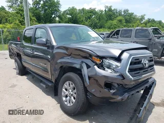 2017 Toyota Tacoma SR5 with VIN 5TFAZ5CN3HX041076, listed as a IAAI auction lot 42424743 with 39,294 mi miles and . Bid and sale history available at DreamBid. Image 1.