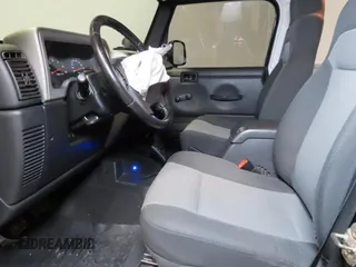 2005 Jeep Wrangler Unlimited with VIN 1J4FA44S75P305935, listed as a Copart auction lot 52035455 with 116,569 mi miles and Salvage Title. Bid and sale history available at carsss.com. Image 9.