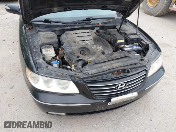 2007 Hyundai Azera SE z VIN KMHFC46F67A244191, wystawiony jako IAAI lot #42273775 z przebiegiem 178 713 mil mil oraz . Historia ofert i sprzedaży dostępna na DreamBid. Obrazek 17.