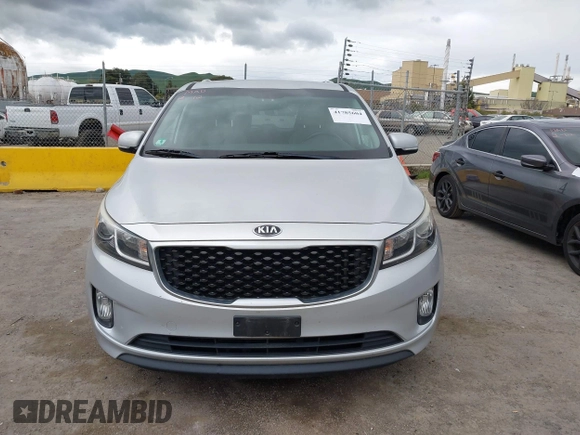 2016 Kia Sedona EX with VIN KNDMC5C13G6100420, listed as a IAAI auction lot 41785604 with 142,677 mi miles. Bid and sale history available at carsss.com. Image 12.