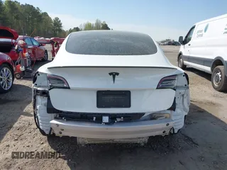 2022 Tesla Model 3 with VIN 5YJ3E1EA5NF124148, listed as a IAAI auction lot 41908884 with 45,115 mi miles. Bid and sale history available at carsss.com. Image 17.