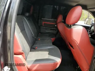 2015 Ram 1500 Rebel z VIN 1C6RR7YT3FS780133, wystawiony jako Copart lot #51484275 z przebiegiem 127 543 mil mil oraz Szkoda całkowita • Salvage title. Historia ofert i sprzedaży dostępna na DreamBid. Obrazek 11.