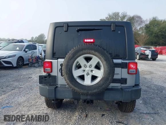 2014 Jeep Wrangler Unlimited Sport with VIN 1C4BJWDG8EL314792, listed as a IAAI auction lot 41489203 with 94,382 mi miles. Bid and sale history available at carsss.com. Image 17.