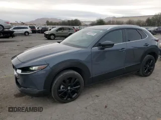 2023 Mazda CX-30 2.5 S Carbon Edition with VIN 3MVDMBCM8PM540489, listed as a Copart auction lot 48020265 with 22,169 mi miles and Salvage Title. Bid and sale history available at carsss.com. Image 1.