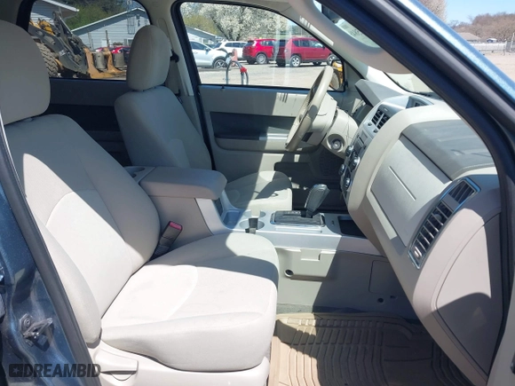 2010 Mercury Mariner with VIN 4M2CN8BG3AKJ01945, listed as a IAAI auction lot 42025848 with 124,617 mi miles. Bid and sale history available at carsss.com. Image 5.