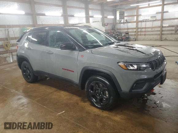 2023 Jeep Compass Trailhawk z VIN 3C4NJDDN9PT557910, wystawiony jako Copart lot #59387825 z przebiegiem 39 686 mil mil oraz Czysty tytuł • Clean title. Historia ofert i sprzedaży dostępna na DreamBid. Obrazek 4.
