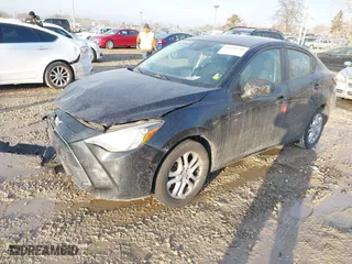 2017 Toyota Yaris iA with VIN 3MYDLBYVXHY185262, listed as a IAAI auction lot 41658750 with 91,326 mi miles. Bid and sale history available at carsss.com. Image 20.