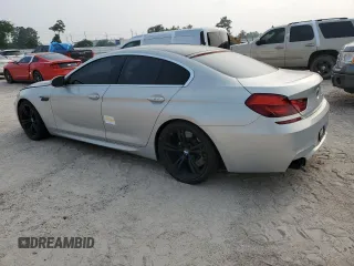 2017 BMW M6 z VIN WBS6E9C56HG437374, wystawiony jako Copart lot #54277624 z przebiegiem 80 858 mil mil oraz . Historia ofert i sprzedaży dostępna na DreamBid. Obrazek 2.