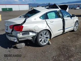 2014 Chevrolet Impala LTZ with VIN 2G1155S30E9204877, listed as a IAAI auction lot 42056615 with Not Provided miles and . Bid and sale history available at DreamBid. Image 4.
