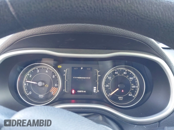 2014 Jeep Cherokee Sport with VIN 1C4PJLAB4EW110051, listed as a IAAI auction lot 41961698 with 153,570 mi miles and . Bid and sale history available at DreamBid. Image 7.