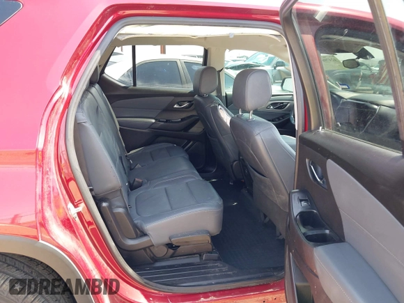 2021 Chevrolet Traverse LT with VIN 1GNERHKW9MJ117918, listed as a IAAI auction lot 42470808 with 77,535 mi miles and . Bid and sale history available at DreamBid. Image 8.