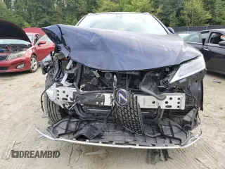 2022 Lexus RX with VIN JTJJGKFA7N2029399, listed as a Copart auction lot 70560884 with 13,672 mi miles and Salvage Title. Bid and sale history available at carsss.com. Image 5.