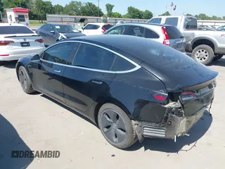 2018 Tesla Model 3 Long Range Battery with VIN 5YJ3E1EA7JF098632, listed as a IAAI auction lot 42002181 with 73,371 mi miles and . Bid and sale history available at DreamBid. Image 3.