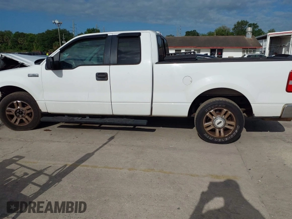 2006 Ford F-150 XL with VIN 1FTPX12VX6NB83220, listed as a IAAI auction lot 42001770 with 228,216 mi miles. Bid and sale history available at carsss.com. Image 15.