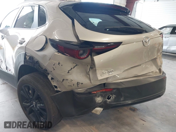 2024 Mazda CX-30 S Select Sport with VIN 3MVDMBBM0RM698491, listed as a IAAI auction lot 42609161 with 21,576 mi miles and . Bid and sale history available at DreamBid. Image 6.