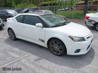 2012 Scion tC with VIN JTKJF5C73C3041792, listed as a IAAI auction lot 42117978 with 111,815 mi miles. Bid and sale history available at carsss.com. Image 1.