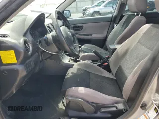 2007 Subaru Impreza i z VIN JF1GD61607G516648, wystawiony jako Copart lot #56343945 z przebiegiem 171 883 mil mil oraz Szkoda całkowita • Salvage title. Historia ofert i sprzedaży dostępna na DreamBid. Obrazek 7.