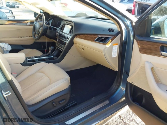 2016 Hyundai Sonata Hybrid Limited with VIN KMHE34L13GA031283, listed as a IAAI auction lot 41476714 with 75,131 mi miles. Bid and sale history available at carsss.com. Image 5.
