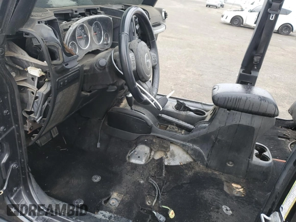 2018 Jeep Wrangler Unlimited Rubicon Recon с VIN 1C4HJWFG8JL847890, выставлен на аукционе Copart как лот 84459074 с пробегом 50 855 миль миль и Списание • Salvage title. История ставок и продаж доступна на DreamBid. Изображение 7.