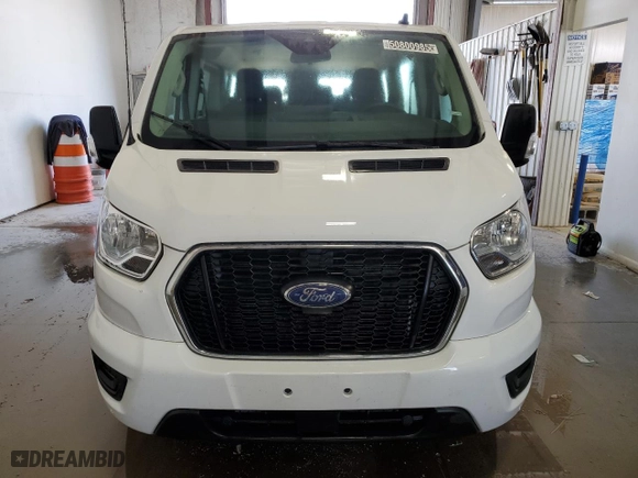 2022 Ford Transit Passenger Wagon XL with VIN 1FBAX2Y87NKA84176, listed as a Copart auction lot 50800985 with 77,909 mi miles and Clean Title. Bid and sale history available at carsss.com. Image 5.