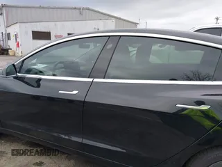 2019 Tesla Model 3 Mid Range with VIN 5YJ3E1EA3KF313425, listed as a IAAI auction lot 41806388 with 110,767 mi miles and . Bid and sale history available at carsss.com. Image 14.