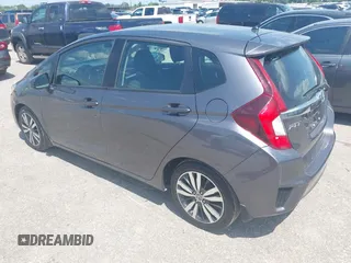 2015 Honda Fit EX-L with VIN 3HGGK5H80FM727081, listed as a IAAI auction lot 42232315 with 57,906 mi miles and . Bid and sale history available at DreamBid. Image 3.