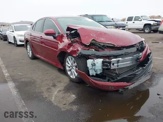 2020 Toyota Camry LE with VIN 4T1C11AK0LU954420, listed as a IAAI auction lot 41576657 with 56,863 mi miles. Bid and sale history available at carsss.com. Image 1.