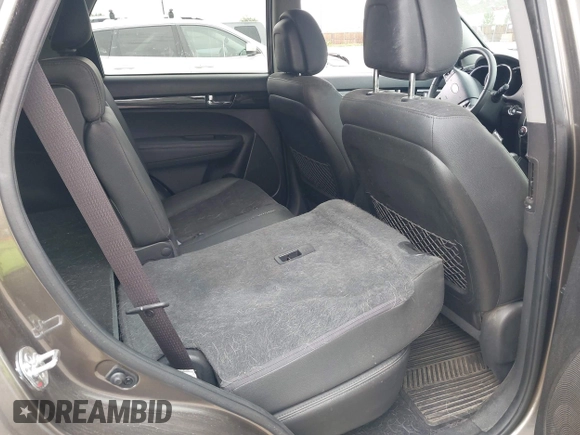 2012 Kia Sorento EX with VIN 5XYKUCA6XCG294104, listed as a IAAI auction lot 42413363 with 57,527 mi miles and . Bid and sale history available at DreamBid. Image 8.