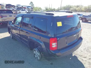 2014 Jeep Patriot Sport with VIN 1C4NJPBB4ED859196, listed as a IAAI auction lot 41815149 with 140,612 mi miles and . Bid and sale history available at carsss.com. Image 3.